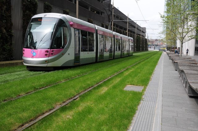 Tram on a patch of grass